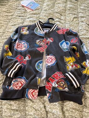 Kids Black Graphic Bomber Jacket with Colorful Game Character Patches